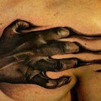 3D very detailed colored zombie hand tattoo on chest and shoulder