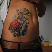 3D very detailed colorful side tattoo of human heart and brains on libras