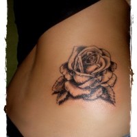3D very realistic big detailed black ink rose tattoo on waist