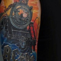 3D very realistic old steamy train tattoo on arm with lettering AC/DC