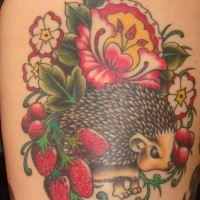 Amazing colorful hedgehog with berries and flowers tattoo