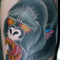 Amazing old school color-ink gorilla head tattoo on arm