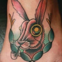 Animated hare with tobacco pipe tattoo on foot