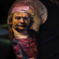 Art style colored upper arm tattoo of baker portrait