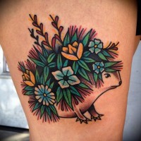 Awesome animated flowered hedgehog tattoo on thigh