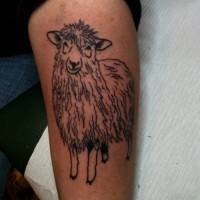 Awesome black-ink sheep tattoo on arm