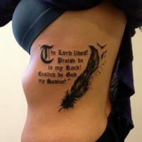 Awesome black feather bird with gothic-lettered quote tattoos on rib-side