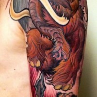 Awesome color-ink fighting mammoth tattoo on upper arm