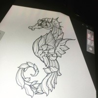 Awesome colorless lea-decorated seahorse tattoo design