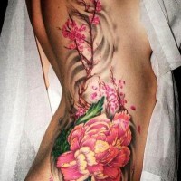 Awesome peony flower tattoo on side