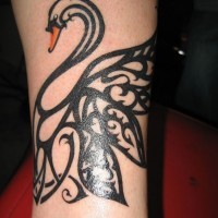 Awesome tribal black-ink swan tattoo on arm