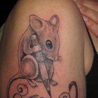 Awesome uncolored rodent with pencil and quote tattoo on upper arm