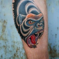 Awesomeold school colorful gorilla head tattoo on arm
