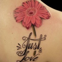 Beautiful pink daisy flower with quote tattoo