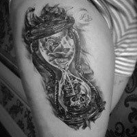 Black hourglass with roses and dead tattoo