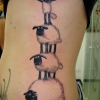 Cartoon black-ink sheep pyramid tattoo on side