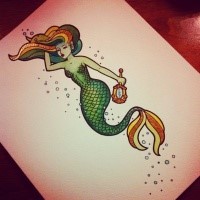 Charming green-scaled mermaid with golden mirror tattoo design