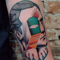 Colorié par Mariusz Trubisz tatouage de la tête de l'homme