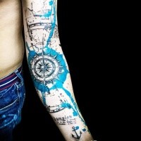 Colored trash polka style whole sleeve tattoo of compas with map
