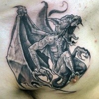 Tatuaggio di gargoyle con pietra demoniaca con dettagli in stile fumetti sul petto