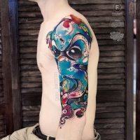 Cool abstract watercolor octopus tattoo on shoulder