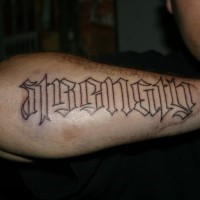 Cool black-contour strenght word tattoo on forearm