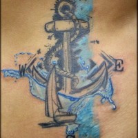 Tatuaje  de ancla compás  de madera con agua y velero