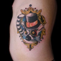 Cool colorful lemur in hat looking out of mirror frame tattoo on side