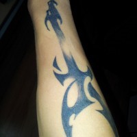 Cool tribal black guitar tattoo on forearm