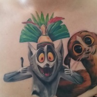 Crazy animated colorful lemur tattoo on chest