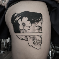 Creative half woman half skull tattoo