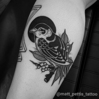 Cute black bird tattoo on leg