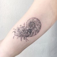 Cute designed black ink biceps tattoo of nautilus with flowers