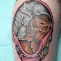 Cute unborn colorful mammoth and elephant tattoo on thigh