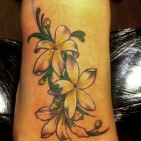 Cute white jasmine flowers tattoo on foot