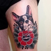 Doggie and traditional flower tattoo for men on thigh