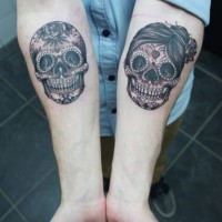 Double amuse girly muerte skull tattoo on forearms