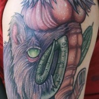 Exiting colorful mammoth baby tattoo on upper arm