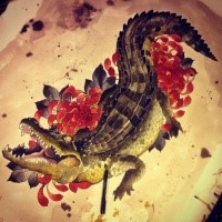 Gorgeous reptile and red pwony glowers tattoo design