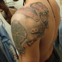 Great armor with Celtic cross tattoo on shoulder