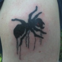 Great black-ink ant with smudges tattoo on shoulder