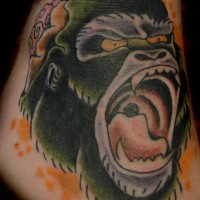 Great colorful gnarling gorilla head tattoo