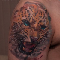 Great leopard head tattoo on shoulder