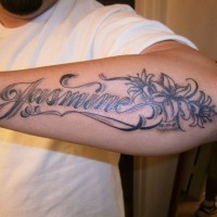 Great name quote with jasmine flowers tattoo on arm