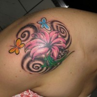 Great pink exotic flower with butterflies tattoo on shoulder