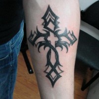 Great trible black-ink cross tattoo for men on forearm