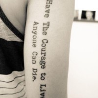 Have the courage to live, everyone can die quote tattoo on arm