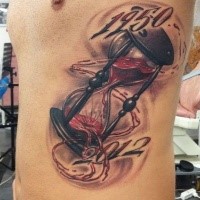 Hourglass and blood with memorable dates tatttoo on side