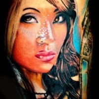 Illustrative like colored arm tattoo of woman portrait