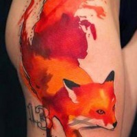 Impressive bright-colored fox tattoo on upper arm